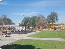 photo showing the play ground equipment at mona park in compton ca